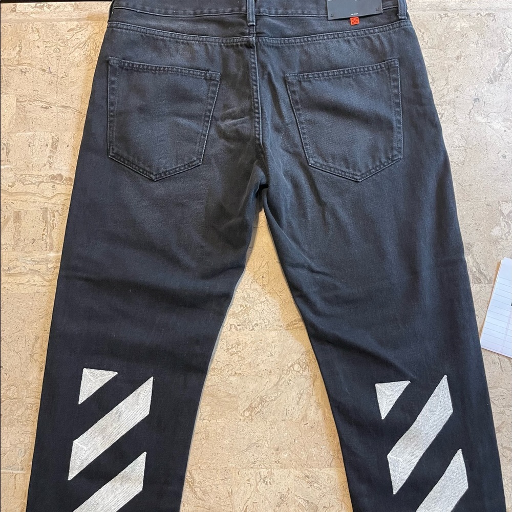 Mens Off White diagonal stripes black denim jeans.